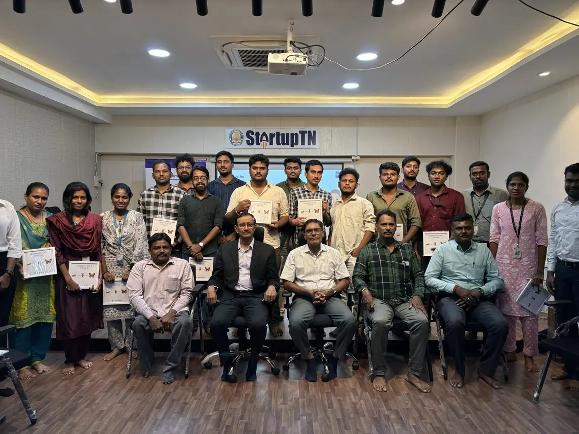 A group photo of IT employees after a session