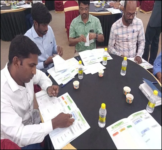 Participants working on an exercise at a table